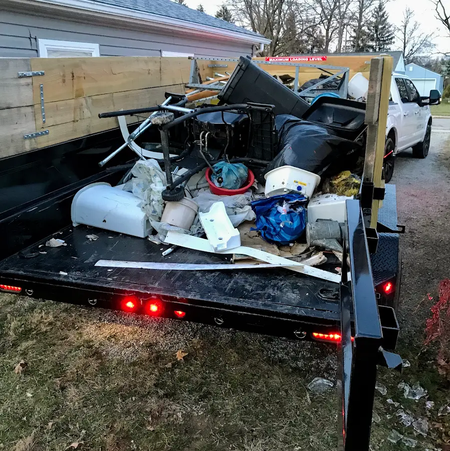 Roll-off dumpster delivered to a residential driveway in Pine Castle